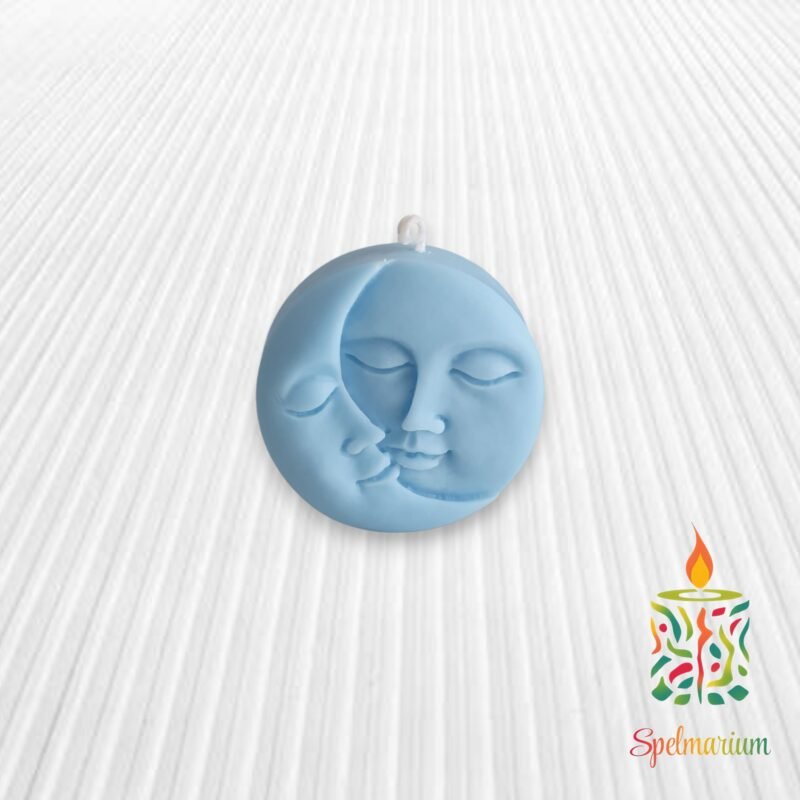 Vela con silueta de sol y luna azul