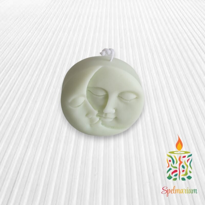 Vela con silueta de sol y luna verde